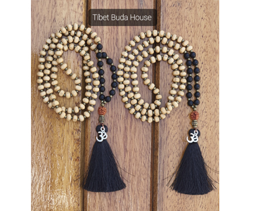 JAPA MALA BUDISTA EN MADERA Y ÓNIX NEGRO + SIMBOLO